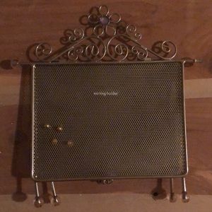 Claire’s silver earrings holder